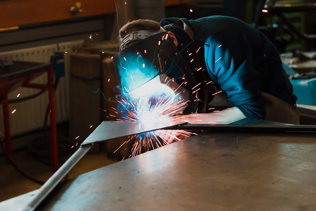 Matt Harris welding in the shop at 704 Diesel and Welding Services