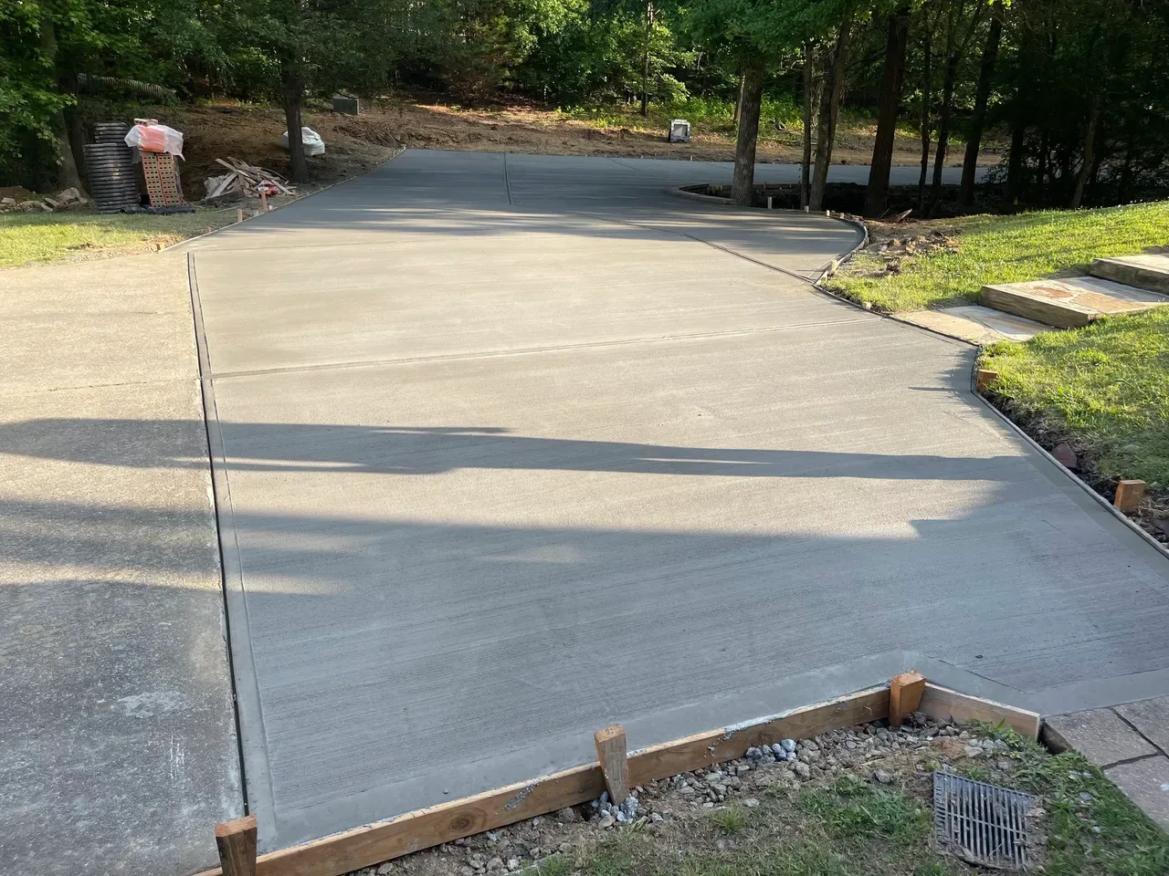 Tiered retaining wall with landscaping by Baxter Site Works in Alpharetta, GA