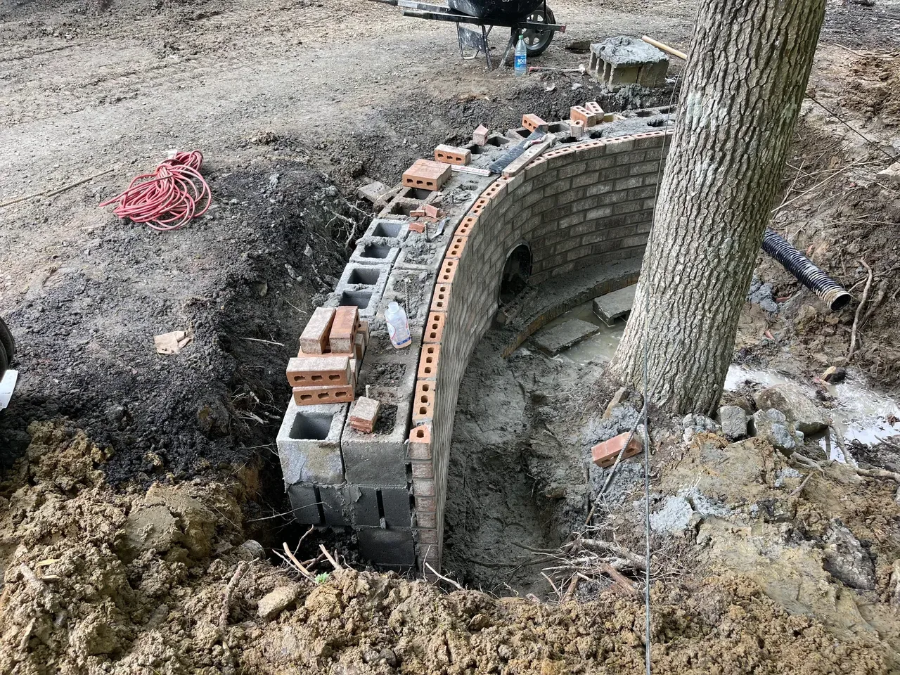 Hardscaping project featuring walkway and outdoor features by Baxter Site Works